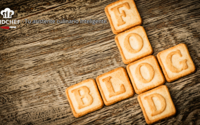 Galletas formando la palabra “Food Blog” sobre una mesa de madera rústica con el texto AidChef, tu asistente culinario inteligente